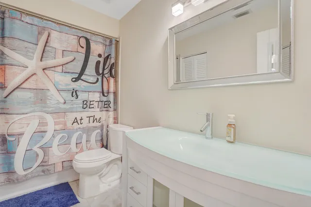 a bathroom with a sink and a toilet