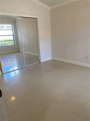 an empty room with a door