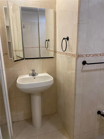 a view of a backyard with a chair