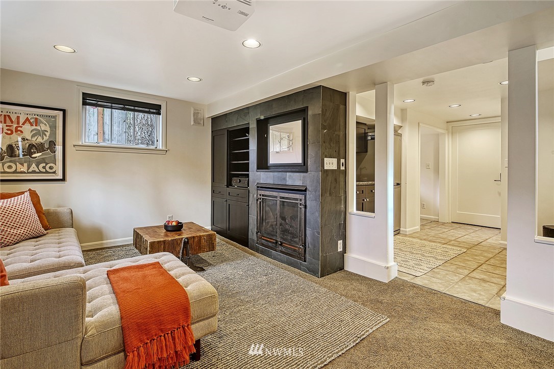 6523 40th Avenue Northeast Seattle, WA 98115 - Photo 18 of 26 a bedroom with furniture and a walk in closet