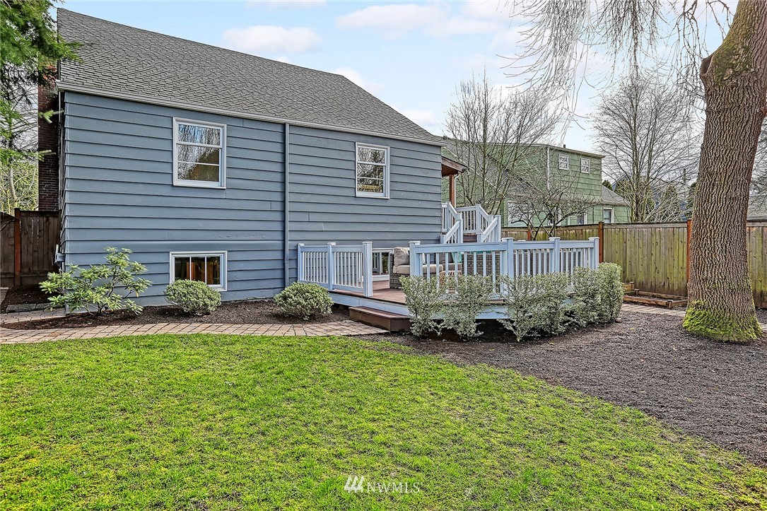 6523 40th Avenue Northeast Seattle, WA 98115 - Photo 26 of 26 a view of a house with a yard and sitting area