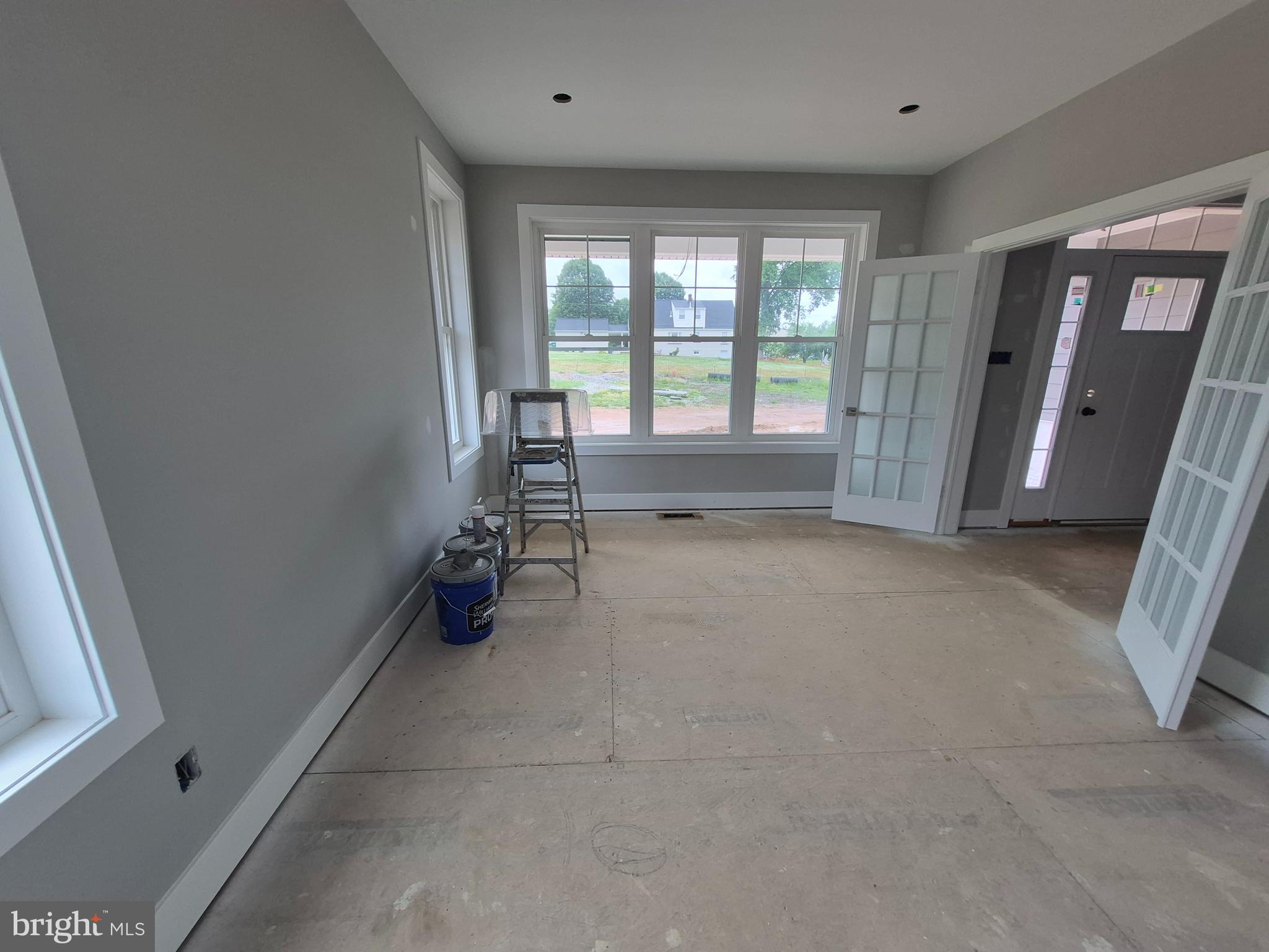 324 Bishop Hollow Road Newtown Square, PA 19073 - Photo 5 of 37 an empty room with windows