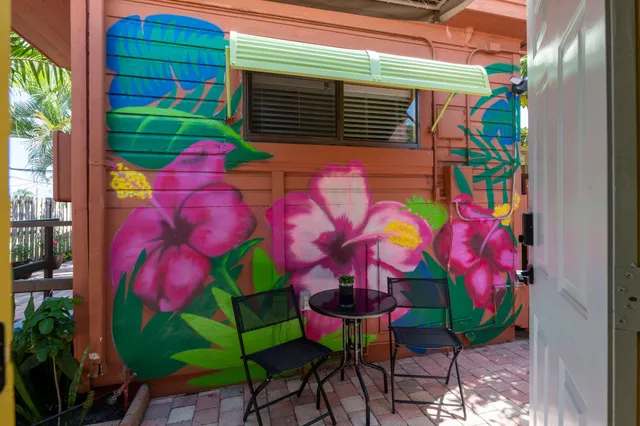 a kitchen with stainless steel appliances granite countertop a refrigerator sink and stove