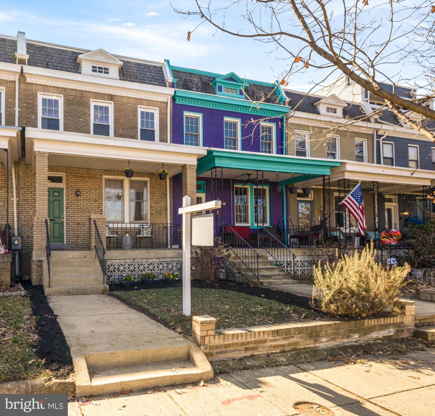 720 Webster Street Northwest Washington, DC 20011 - Photo 2 of 51 a front view of a residential apartment building with a yard