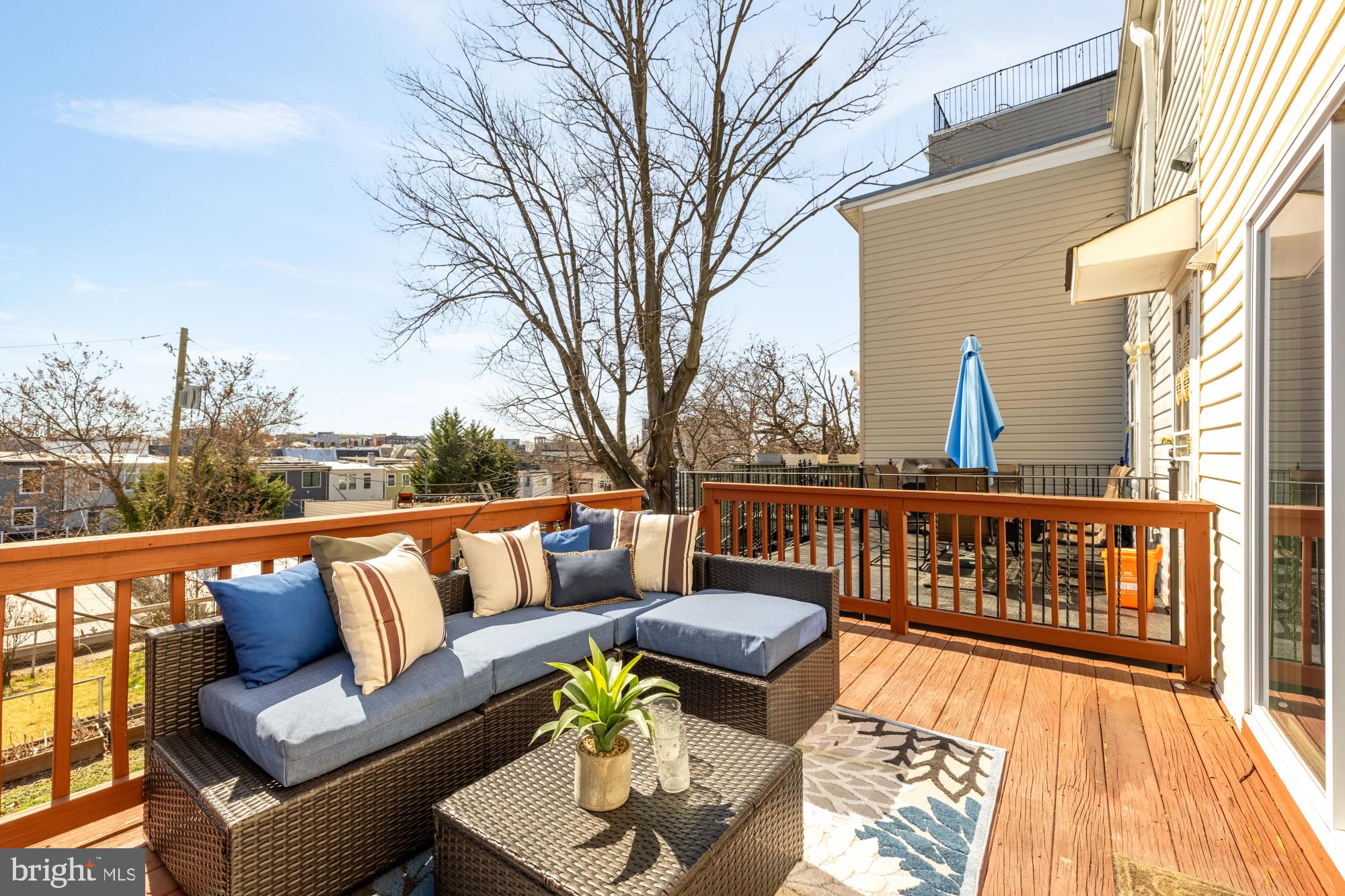 720 Webster Street Northwest Washington, DC 20011 - Photo 21 of 51 a roof deck with couches and wooden floor
