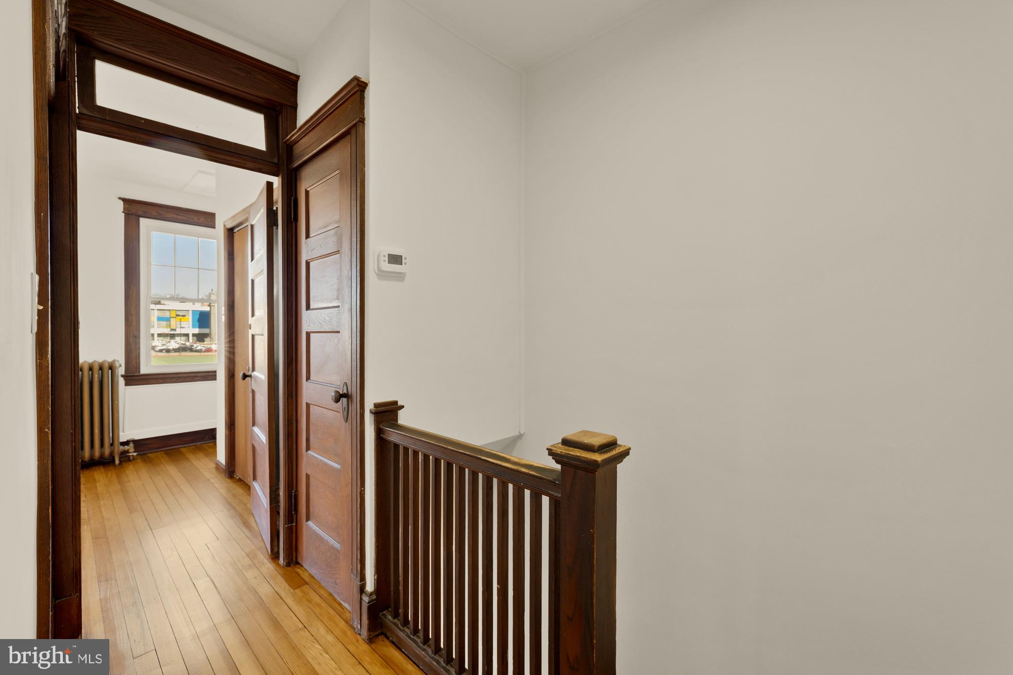 720 Webster Street Northwest Washington, DC 20011 - Photo 22 of 51 a view of a hallway with wooden floor and a hallway