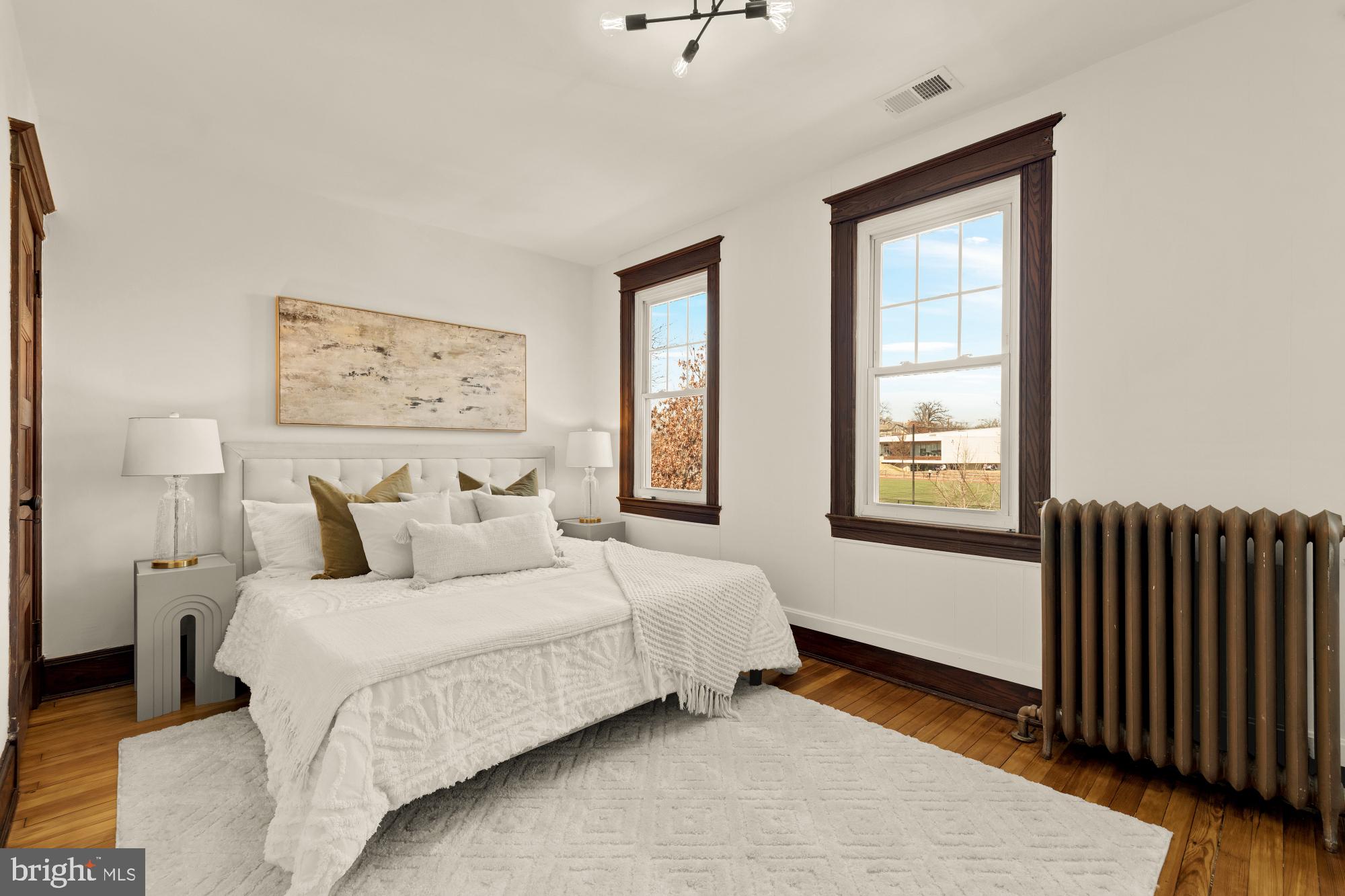 720 Webster Street Northwest Washington, DC 20011 - Photo 23 of 51 a bedroom with a bed and a window