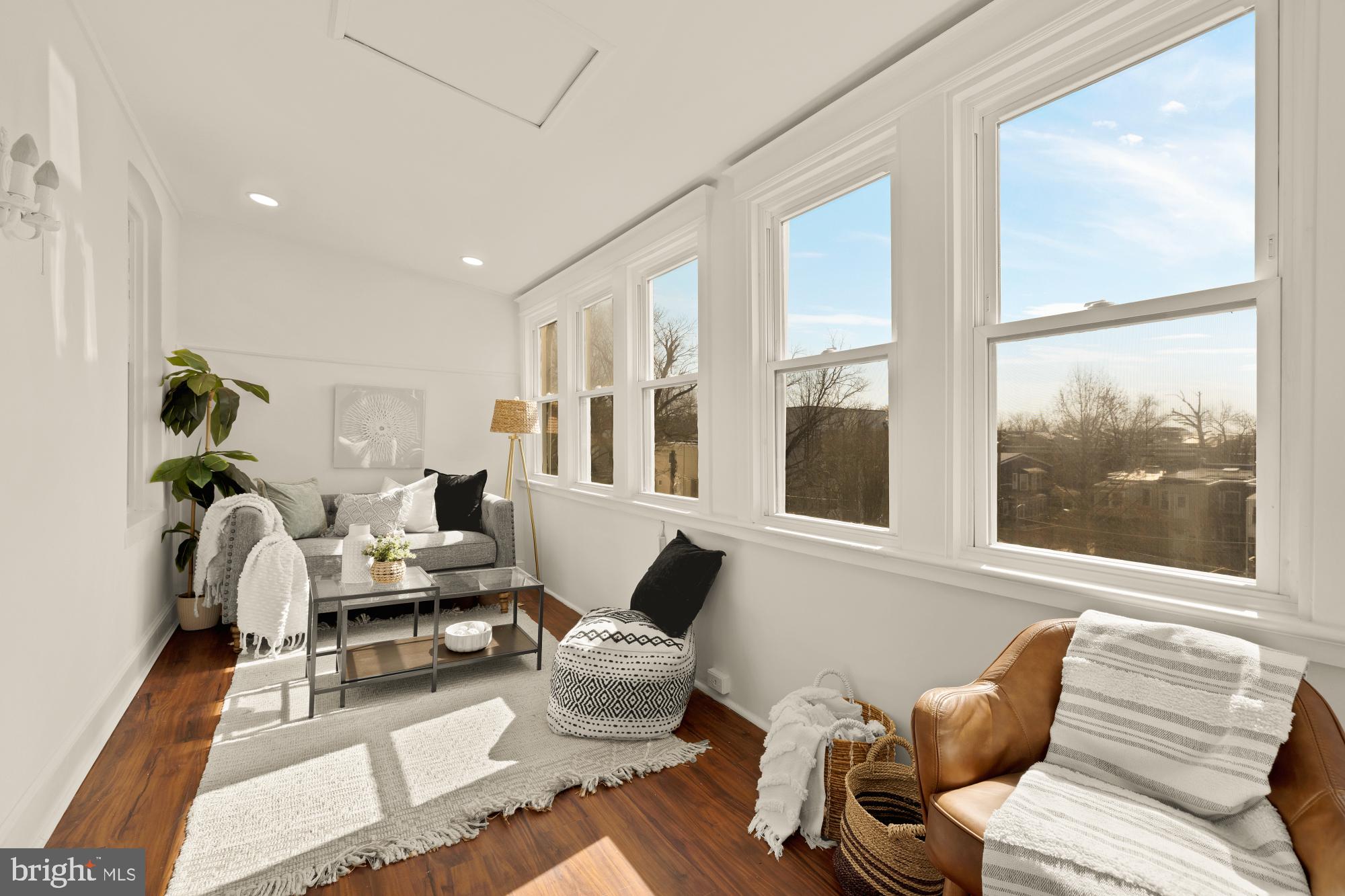 720 Webster Street Northwest Washington, DC 20011 - Photo 27 of 51 a living room with furniture and a large window