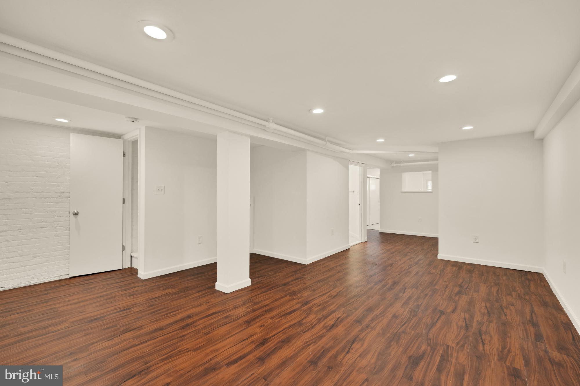 720 Webster Street Northwest Washington, DC 20011 - Photo 31 of 51 a view of an empty room with wooden floor and closet