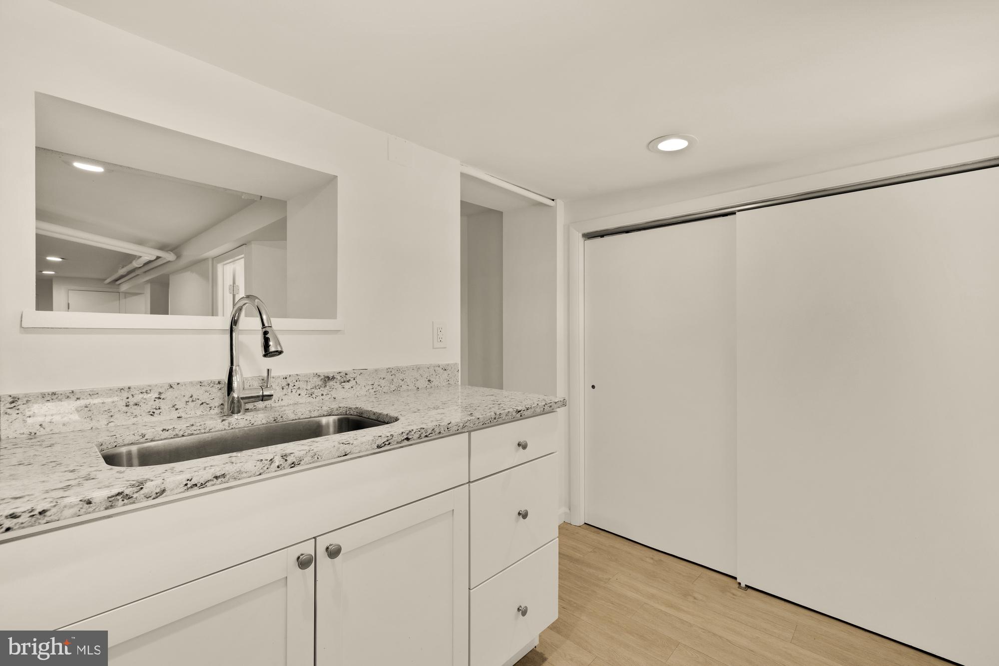 720 Webster Street Northwest Washington, DC 20011 - Photo 36 of 51 a bathroom with a sink and a mirror