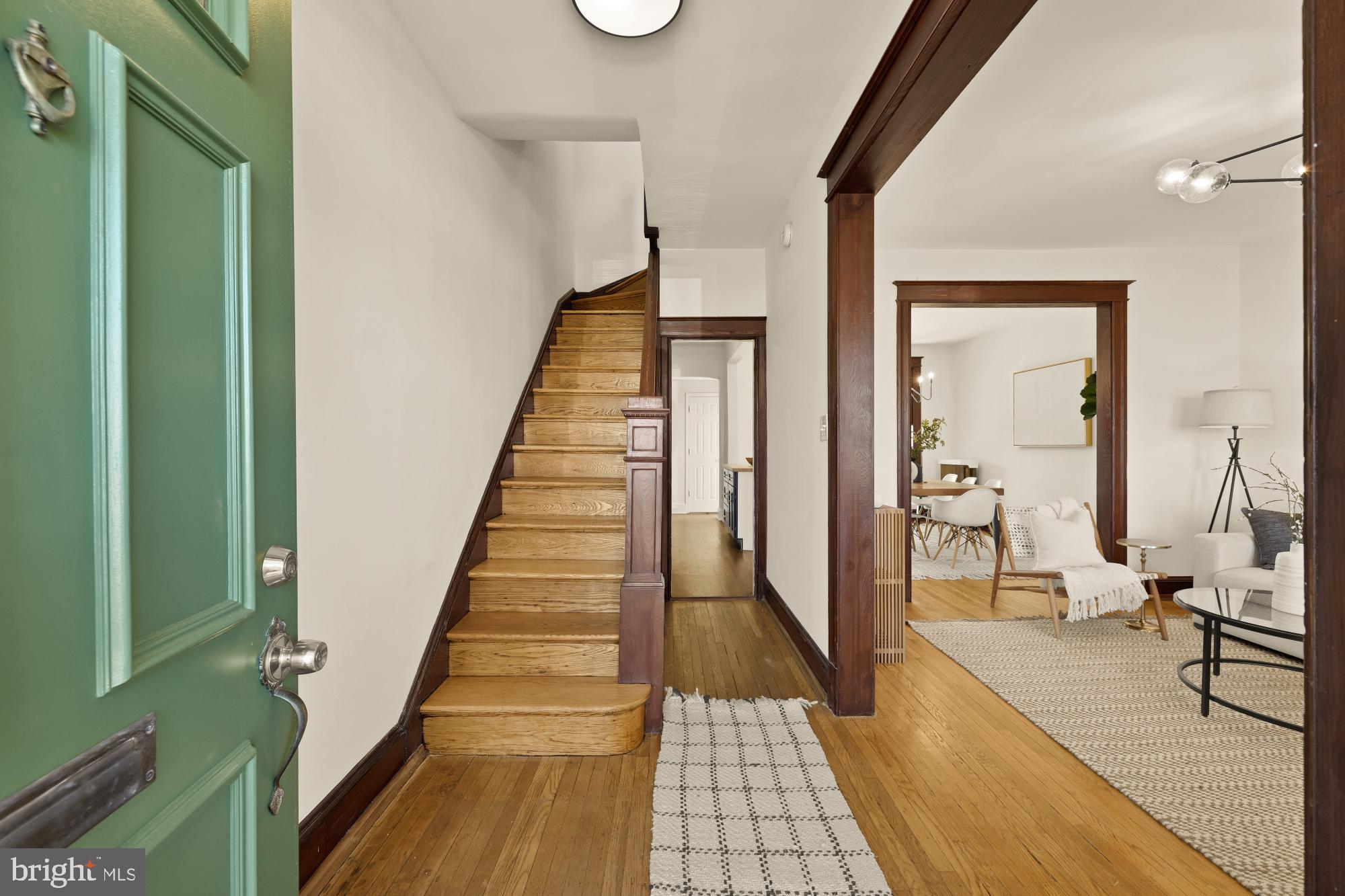 720 Webster Street Northwest Washington, DC 20011 - Photo 4 of 51 a view of a hallway with wooden floor and staircase
