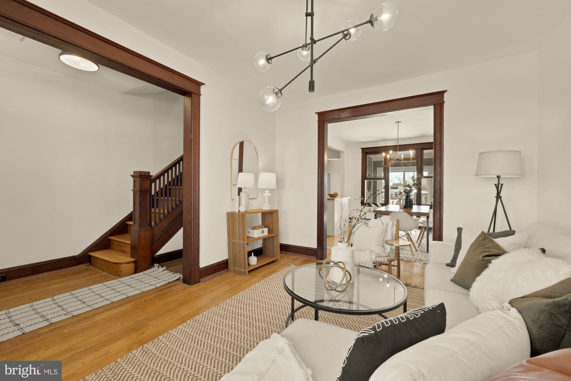 720 Webster Street Northwest Washington, DC 20011 - Photo 7 of 51 a living room with furniture a air conditioner and a wooden floor