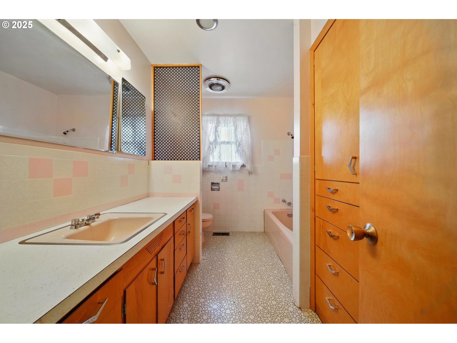 52357 Pleasant View Road Milton Freewater, OR 97862 - Photo 14 of 40 a bathroom with a double vanity sink a mirror and a shower