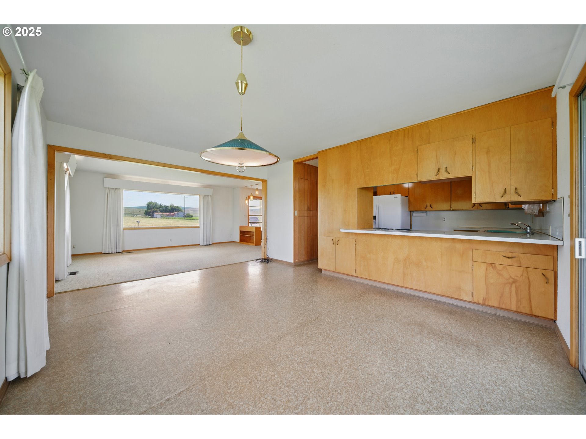52357 Pleasant View Road Milton Freewater, OR 97862 - Photo 3 of 40 a view of a kitchen with a sink and dishwasher