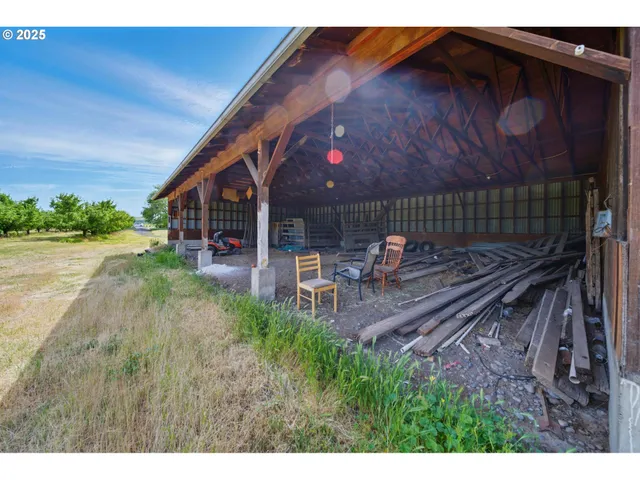 a swimming pool with trees in the background