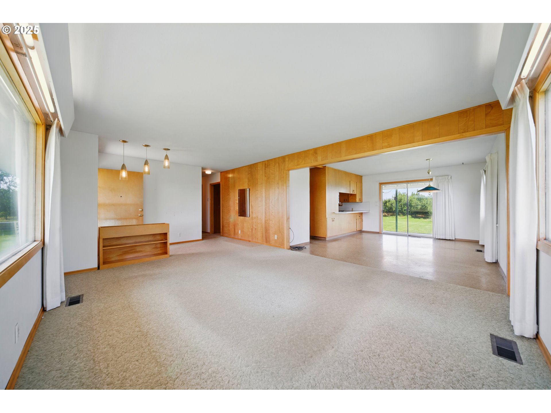 52357 Pleasant View Road Milton Freewater, OR 97862 - Photo 4 of 40 a view of a house with a big yard and potted plants