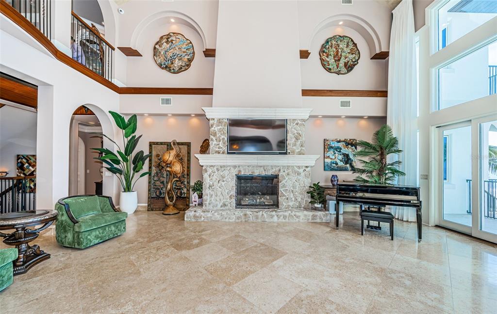 15912 Gulf Boulevard Redington Beach, FL 33708 - Photo 15 of 100 a view of a livingroom with furniture and a fireplace