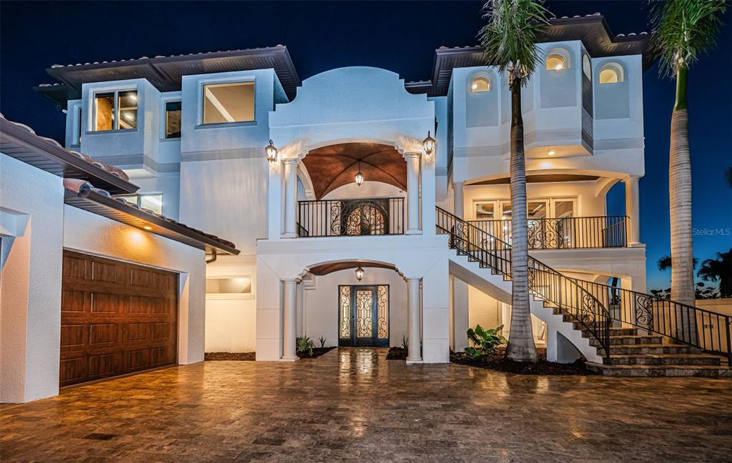 15912 Gulf Boulevard Redington Beach, FL 33708 - Photo 2 of 100 a front view of a building with street