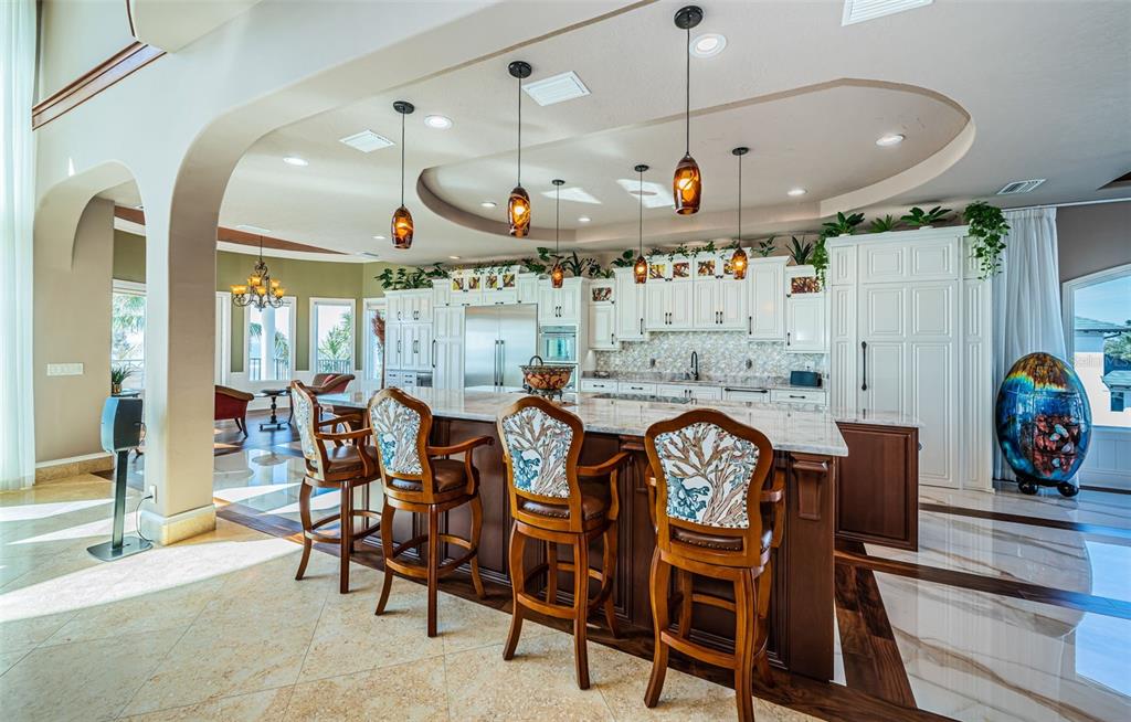 15912 Gulf Boulevard Redington Beach, FL 33708 - Photo 25 of 100 a large kitchen with a table and chairs