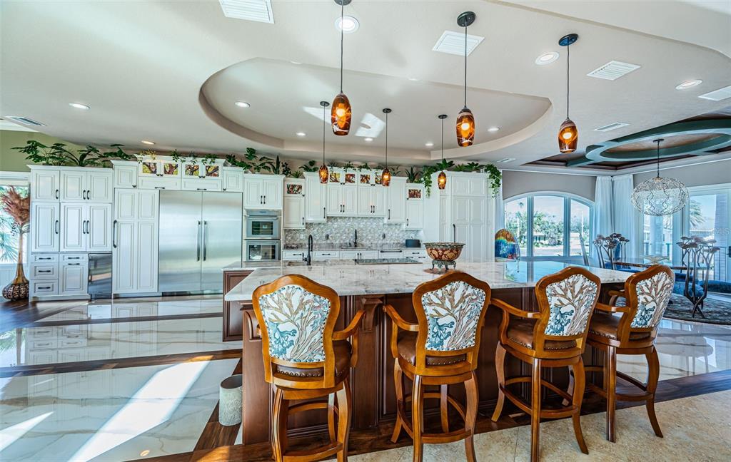 15912 Gulf Boulevard Redington Beach, FL 33708 - Photo 32 of 100 a large kitchen with a table and chairs