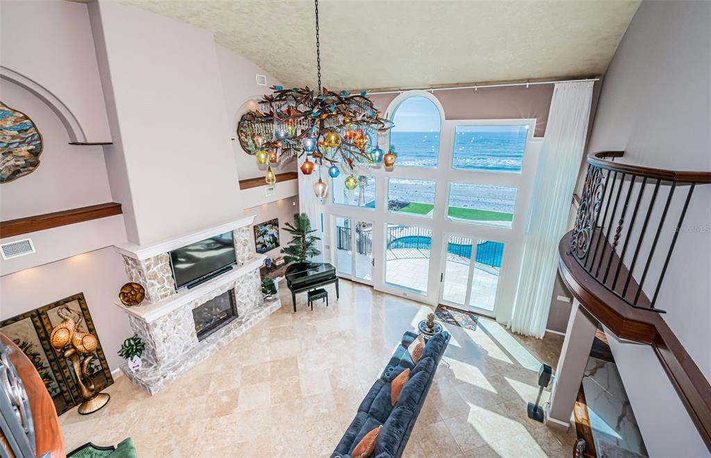 15912 Gulf Boulevard Redington Beach, FL 33708 - Photo 57 of 100 a view of a dining room with furniture and a chandelier