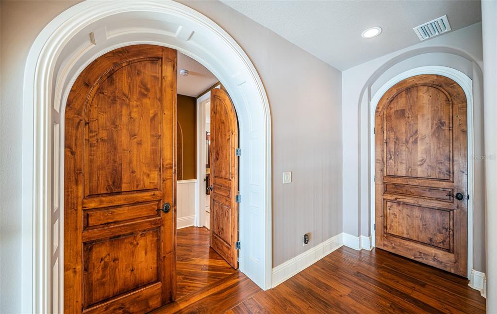 15912 Gulf Boulevard Redington Beach, FL 33708 - Photo 59 of 100 a view of walk in closet with wooden floor