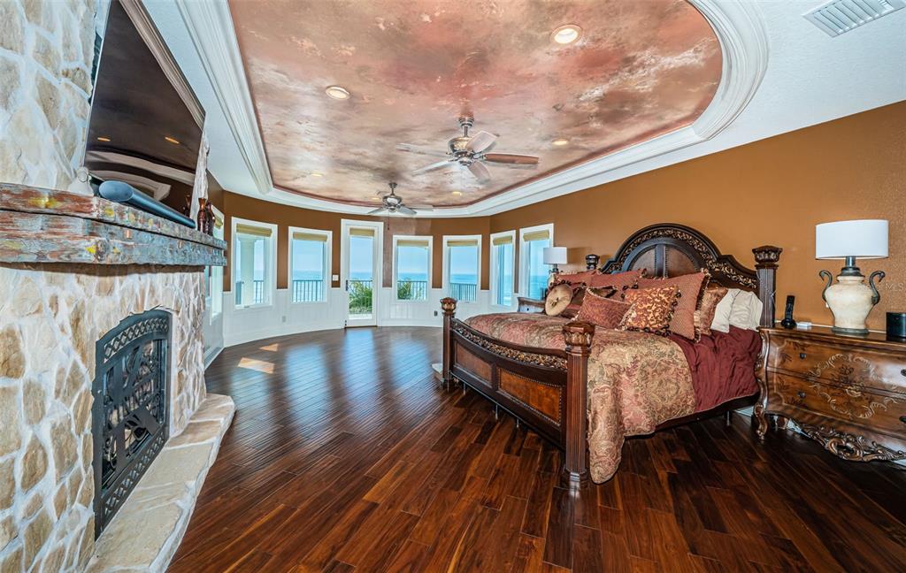 15912 Gulf Boulevard Redington Beach, FL 33708 - Photo 60 of 100 a living room with furniture a fireplace and wooden floor