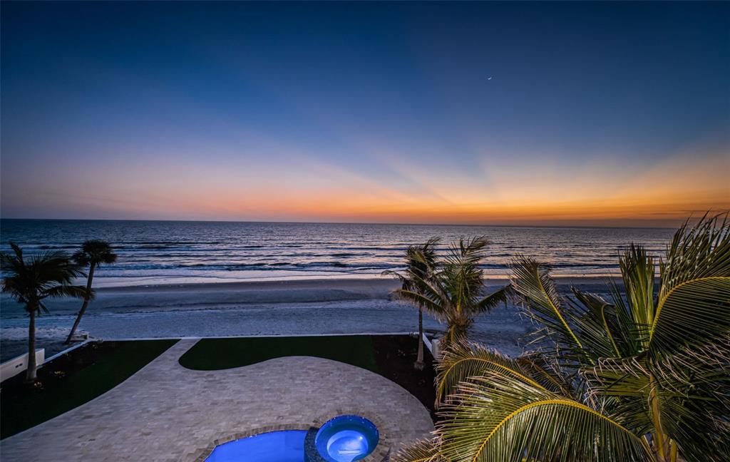 15912 Gulf Boulevard Redington Beach, FL 33708 - Photo 65 of 100 a view of a terrace with wooden floor and a potted plant