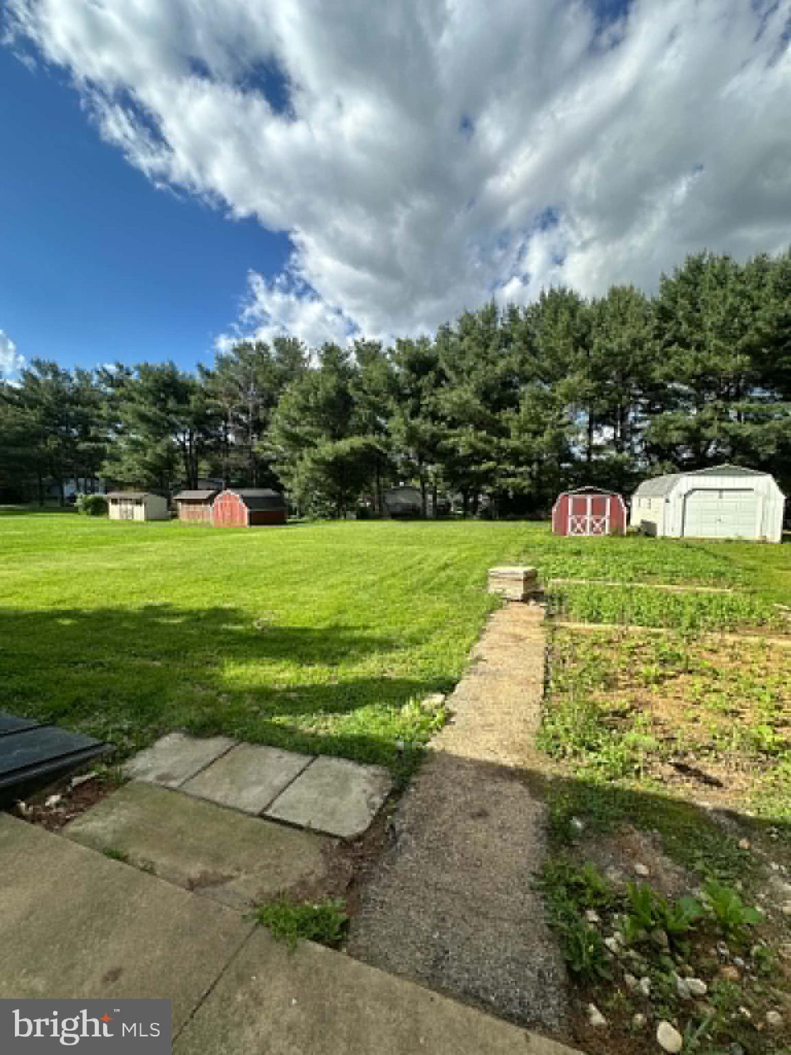 805 Baltimore Road Shippensburg, PA 17257 - Photo 13 of 23 a view of a golf course with a garden
