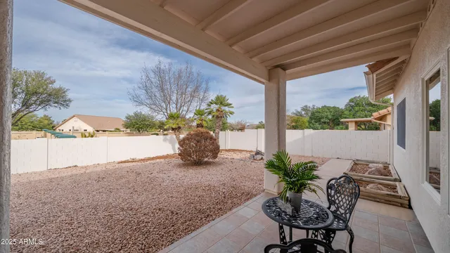 a view of a backyard of the house