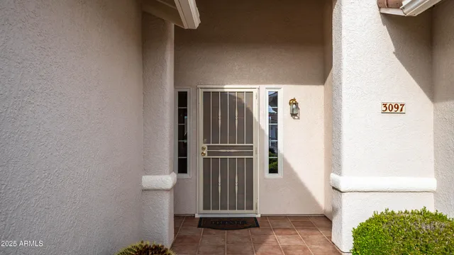 a spacious bathroom with a sink a mirror and a shower