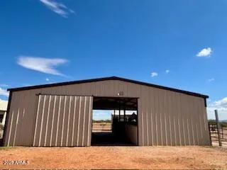 a kitchen with stainless steel appliances kitchen island granite countertop a sink and cabinets