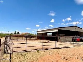 a bedroom with a bed and a table in it