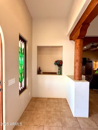 a bathroom with a bathtub and window