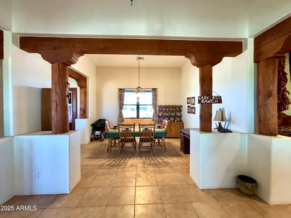 a bathroom with bathtub and window