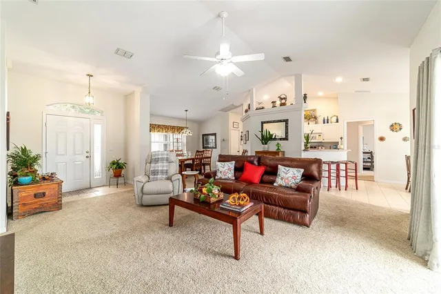 a bedroom with bed and a couch