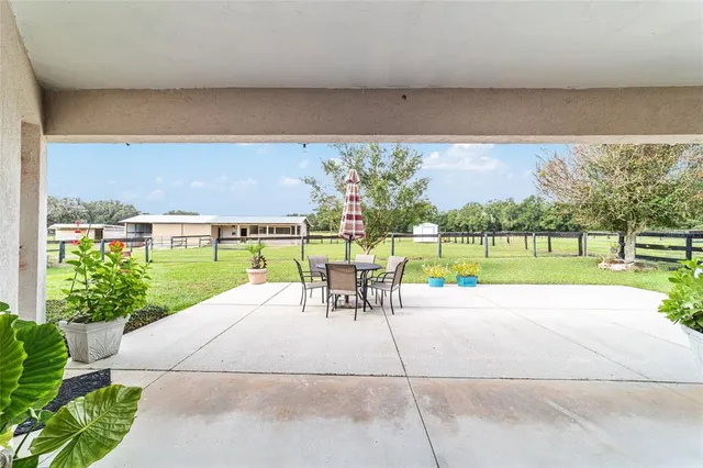 a view of an empty room with wooden roof