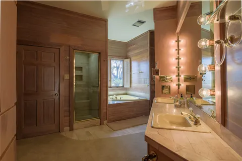 view of hall way with mirror