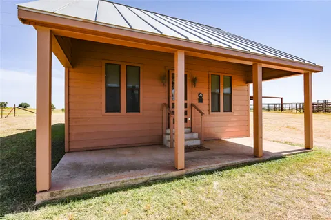 a view of a house with a porch