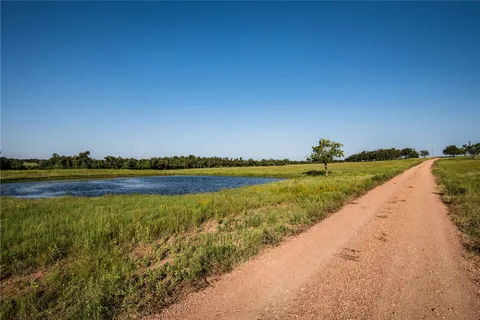 a view of a lake and a mountain in the background