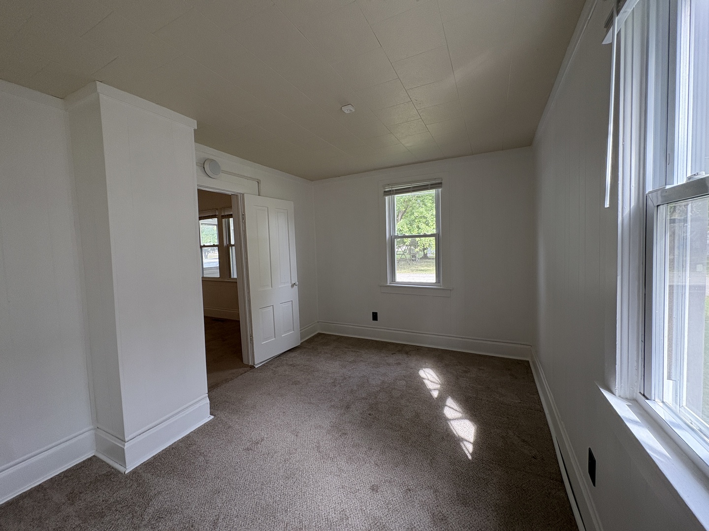 621 West Winthrop Street Earlville, IL 60518 - Photo 11 of 11 an empty room with windows