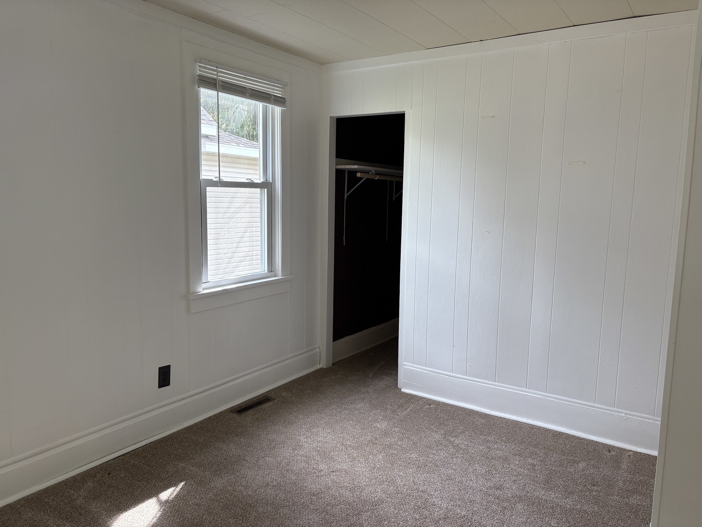 621 West Winthrop Street Earlville, IL 60518 - Photo 10 of 11 an empty room with windows