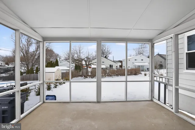 a view of kitchen with furniture and outdoor space