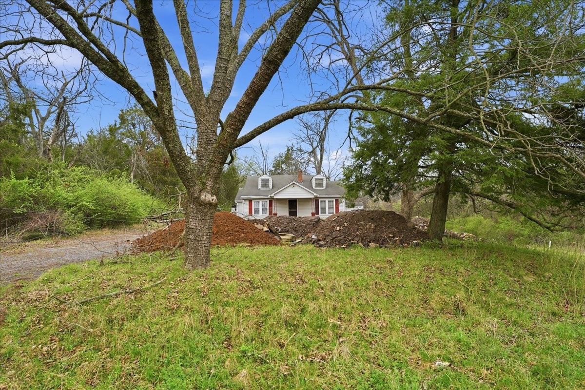 1219 Dickerson Road Goodlettsville, TN 37072 - Photo 13 of 16 a view of a house with a yard