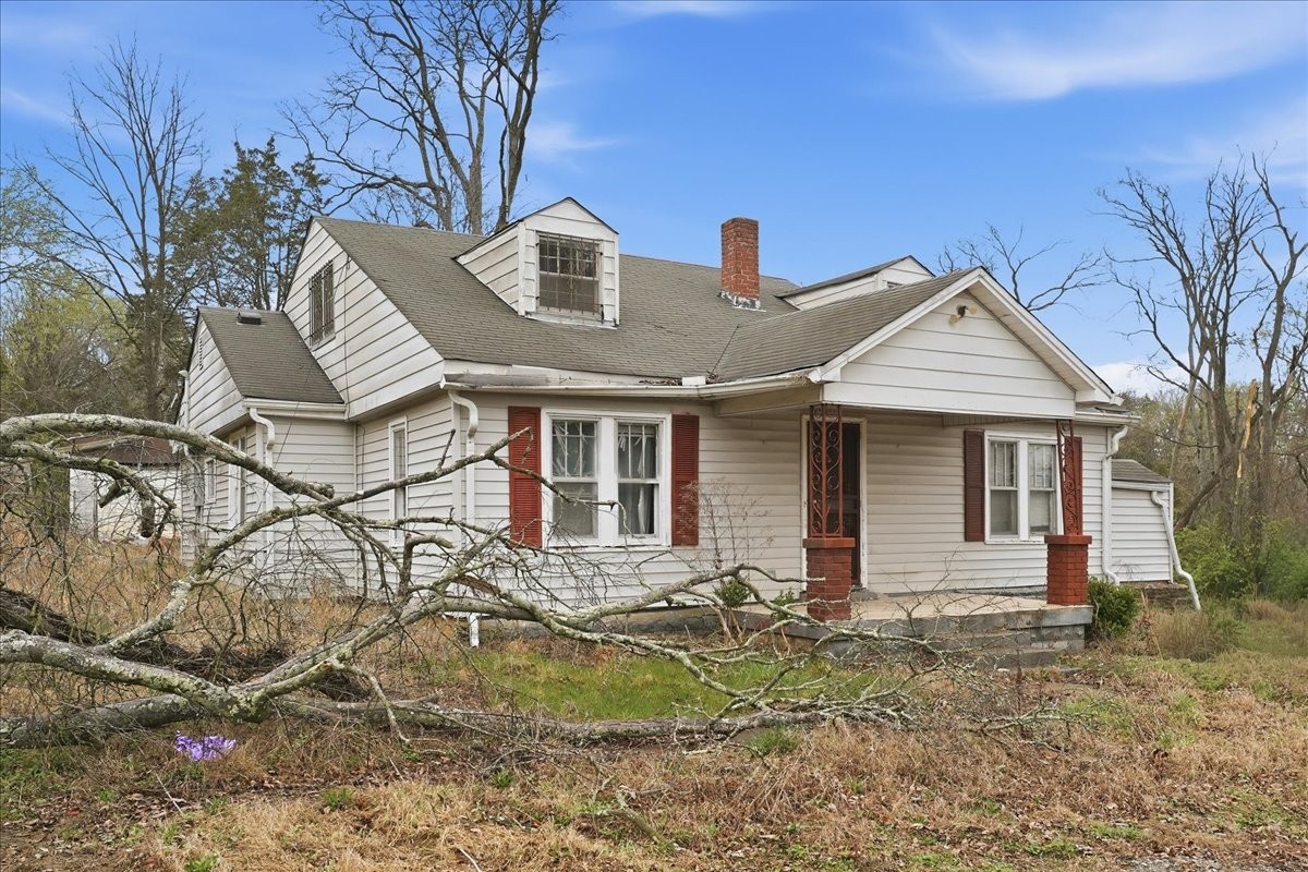 1219 Dickerson Road Goodlettsville, TN 37072 - Photo 14 of 16 a front view of a house with garden