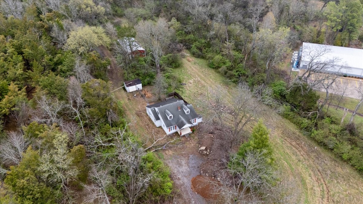 1219 Dickerson Road Goodlettsville, TN 37072 - Photo 6 of 16 an aerial view of a house with a yard