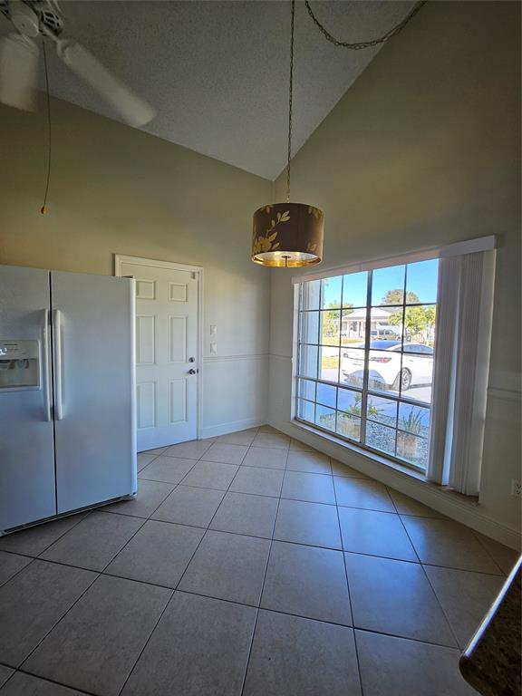8290 Butterfield Lane Boca Raton, FL 33433 - Photo 18 of 38 a view of an empty room with a window