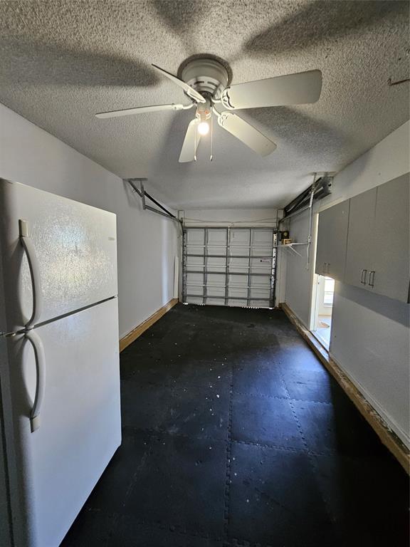 8290 Butterfield Lane Boca Raton, FL 33433 - Photo 27 of 38 a view of a garage