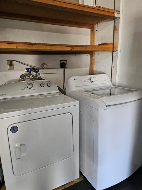 8290 Butterfield Lane Boca Raton, FL 33433 - Photo 28 of 38 a utility room with dryer and washer