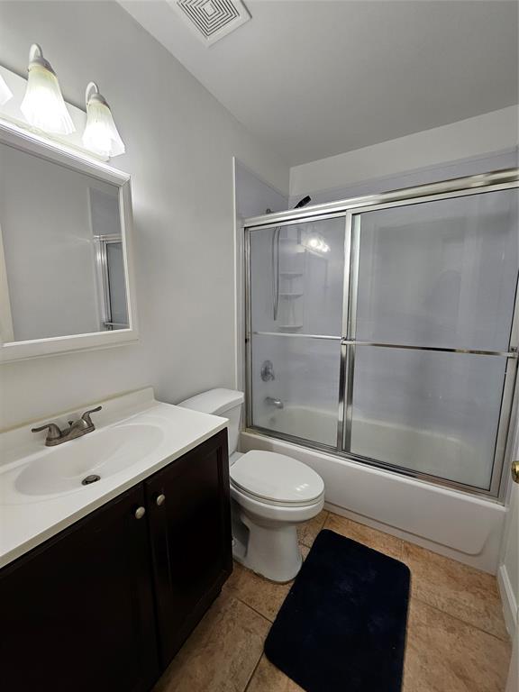 8290 Butterfield Lane Boca Raton, FL 33433 - Photo 31 of 38 a bathroom with a sink a toilet a mirror and shower